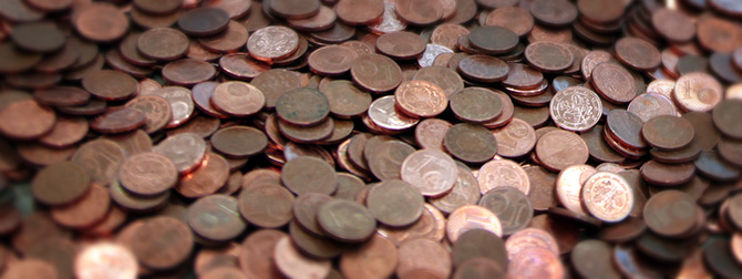 Money Art: thousands of penny pieces form the word trust (Vertrauen)